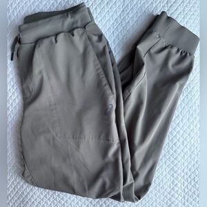 ASICS Brushed-Back Knit Joggers in Taupe Size M